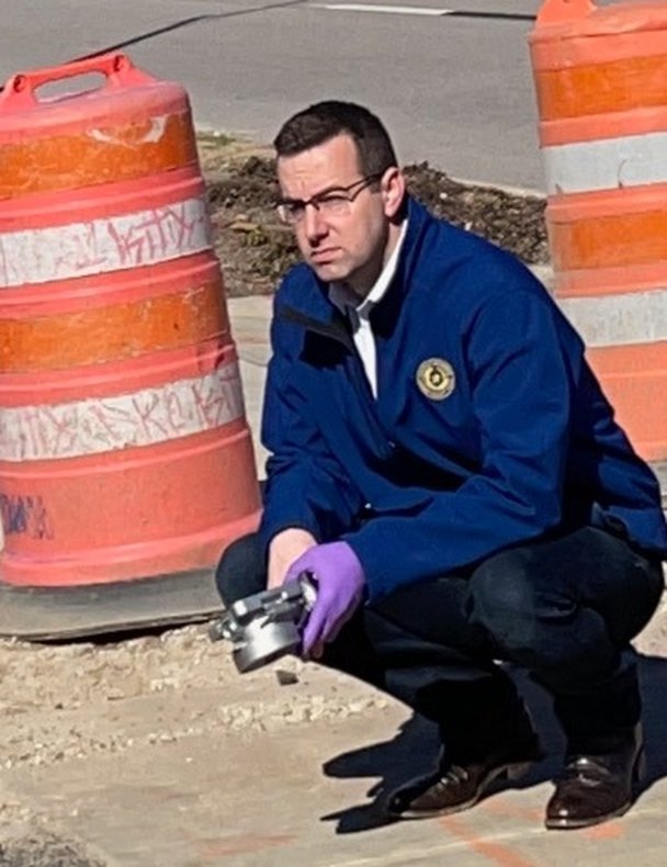 Brian Foley investigating a vehicular crimes scene in Montgomery County, Texas